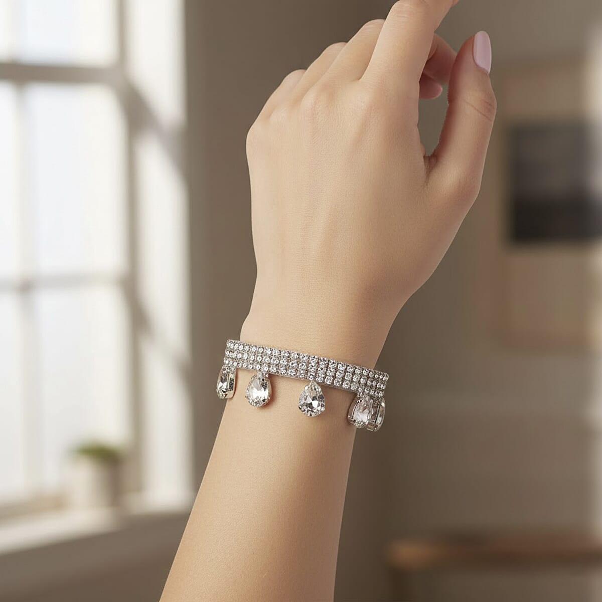 Sparkling Austrian Crystal Dripping Bracelet in Silvertone (7.50-9.50In) image number 2