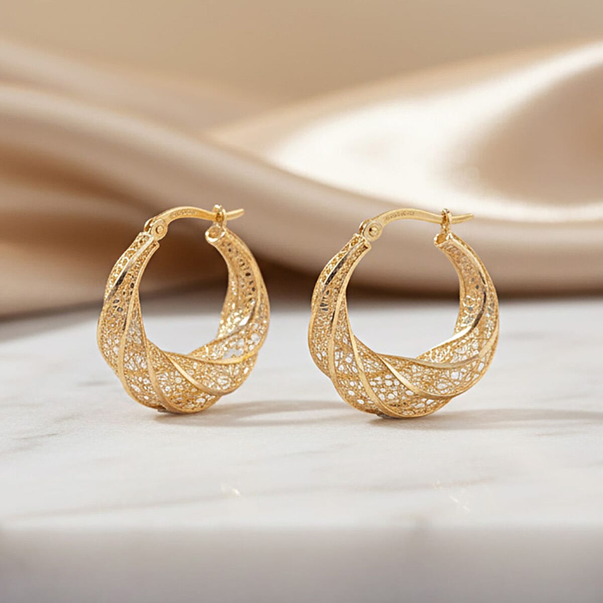 Doorbuster Twisted Hoop Earrings in 14K Yellow Gold 3.19 Grams image number 1