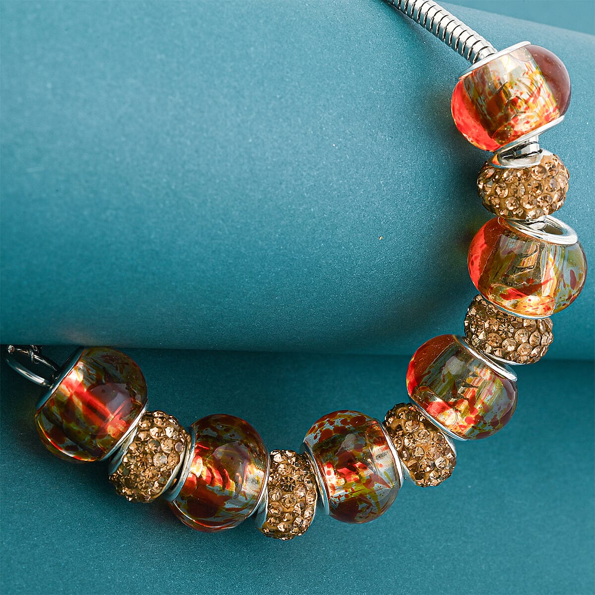 Simulated Orange Diamond Bracelet in Silvertone (7.50-9.50In) image number 1