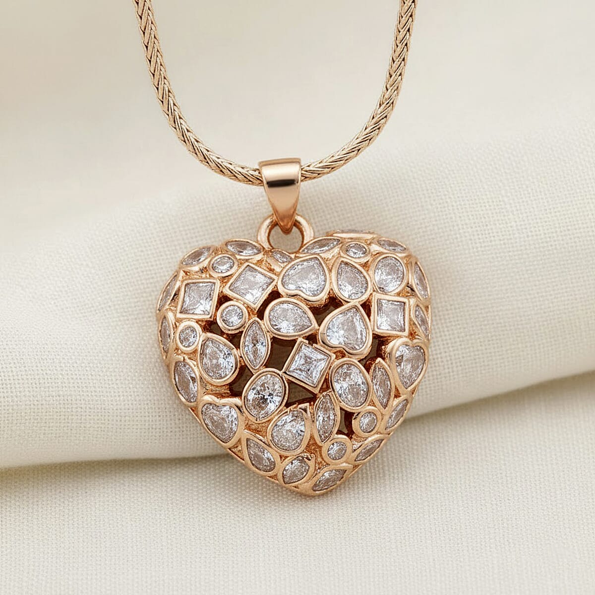 Simulated Diamond Heart Pendant Necklace in Rosetone 20-21.5 Inches  image number 1