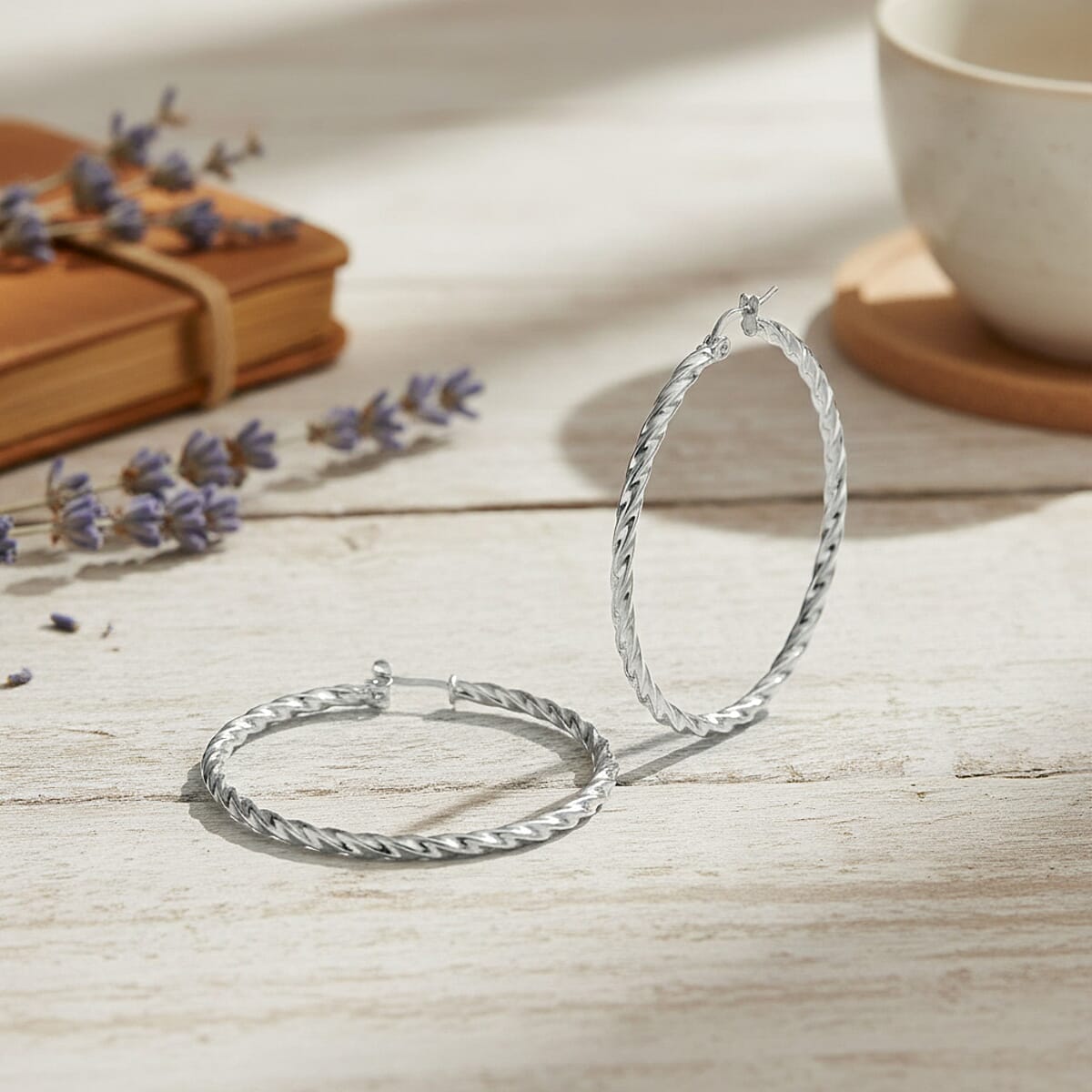 Twisted Hoop Earrings in Stainless Steel image number 1