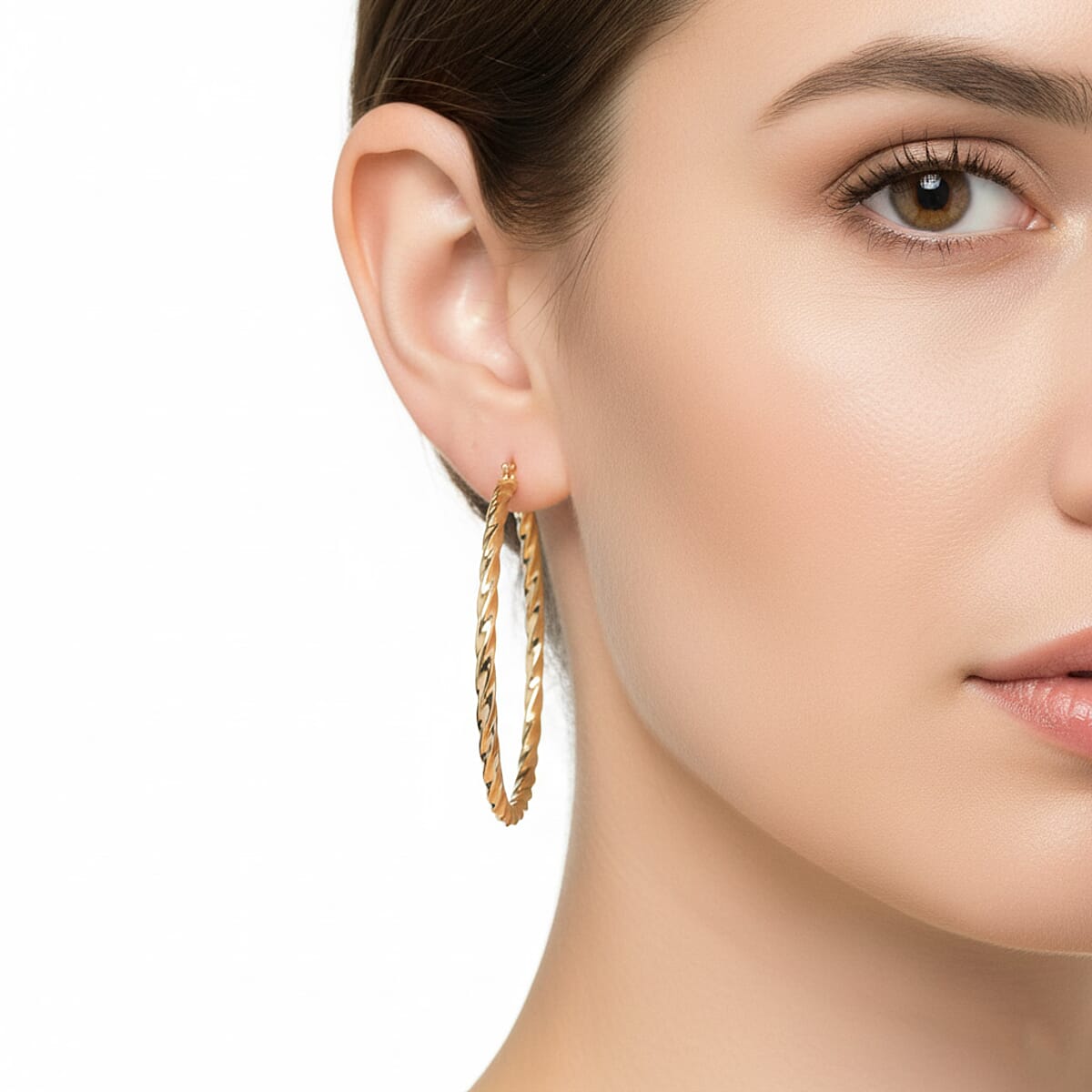 Twisted Hoop Earrings in ION Plated YG Stainless Steel image number 2