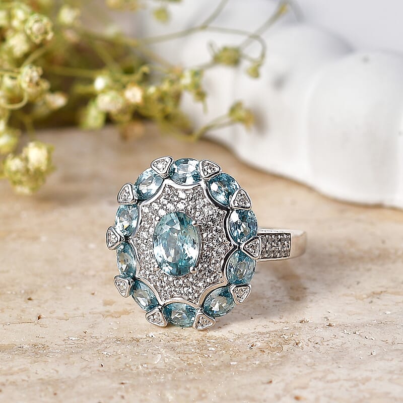 D'Joy Cambodian Blue Zircon and White Zircon 4.60 ctw Zinnia Floral Ring in Rhodium Over Sterling Silver (Size 5.0)