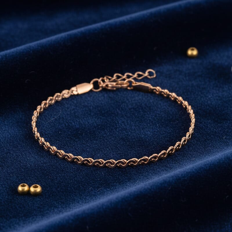 Smooth Curved Twist Chain Bracelet in ION Plated RG Stainless Steel (7.0-8.0In)
