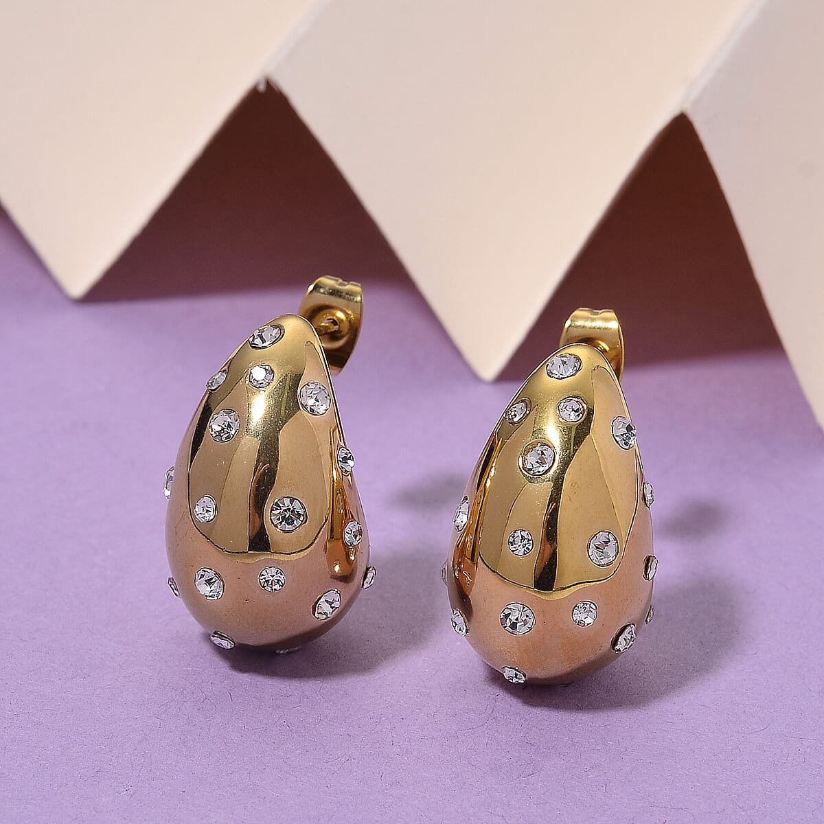 Simulated Diamond Earrings in ION Plated YG Stainless Steel image number 1