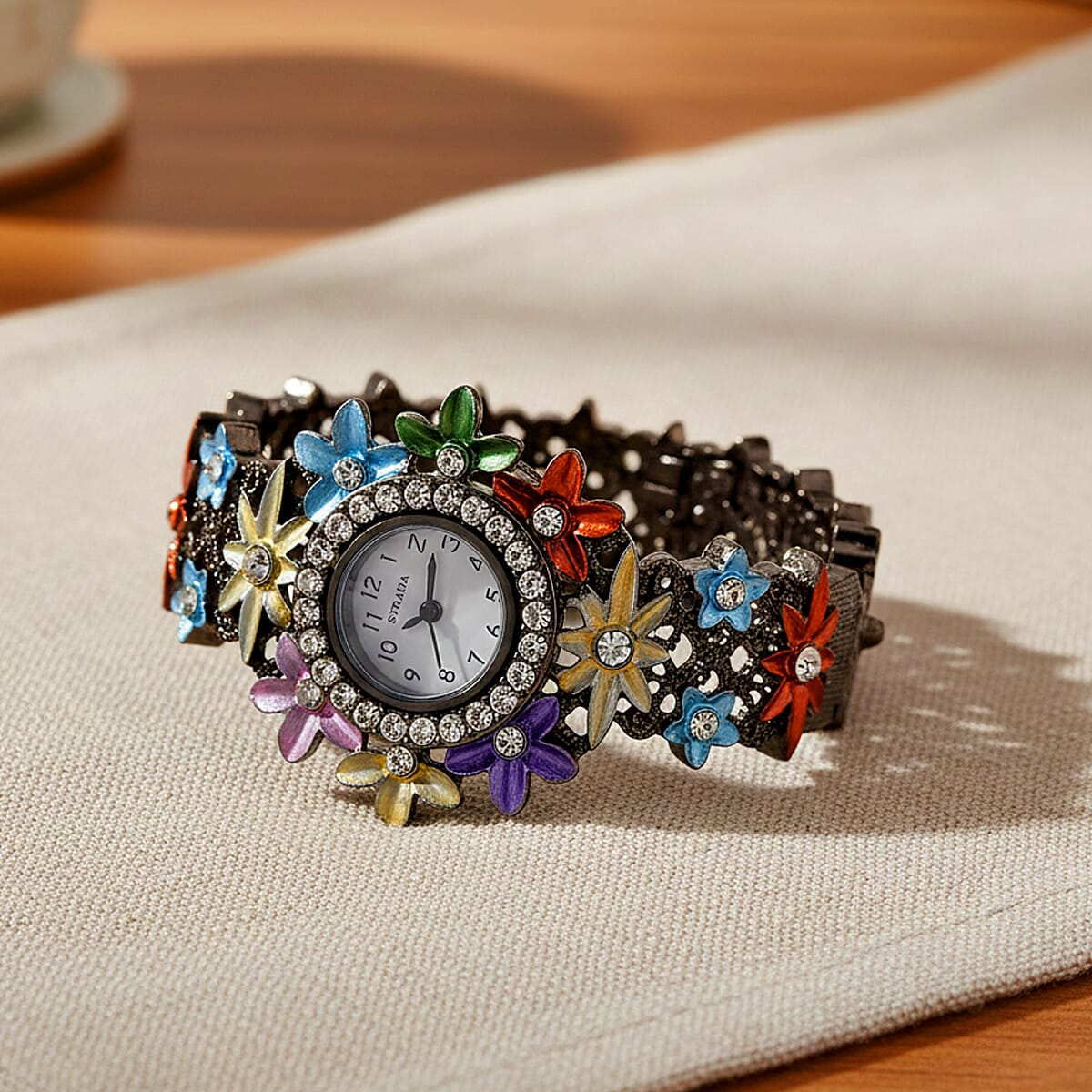 Strada Austrian Crystal Japanese Movement Oil Flower Design Bangle Watch in Blacktone image number 1