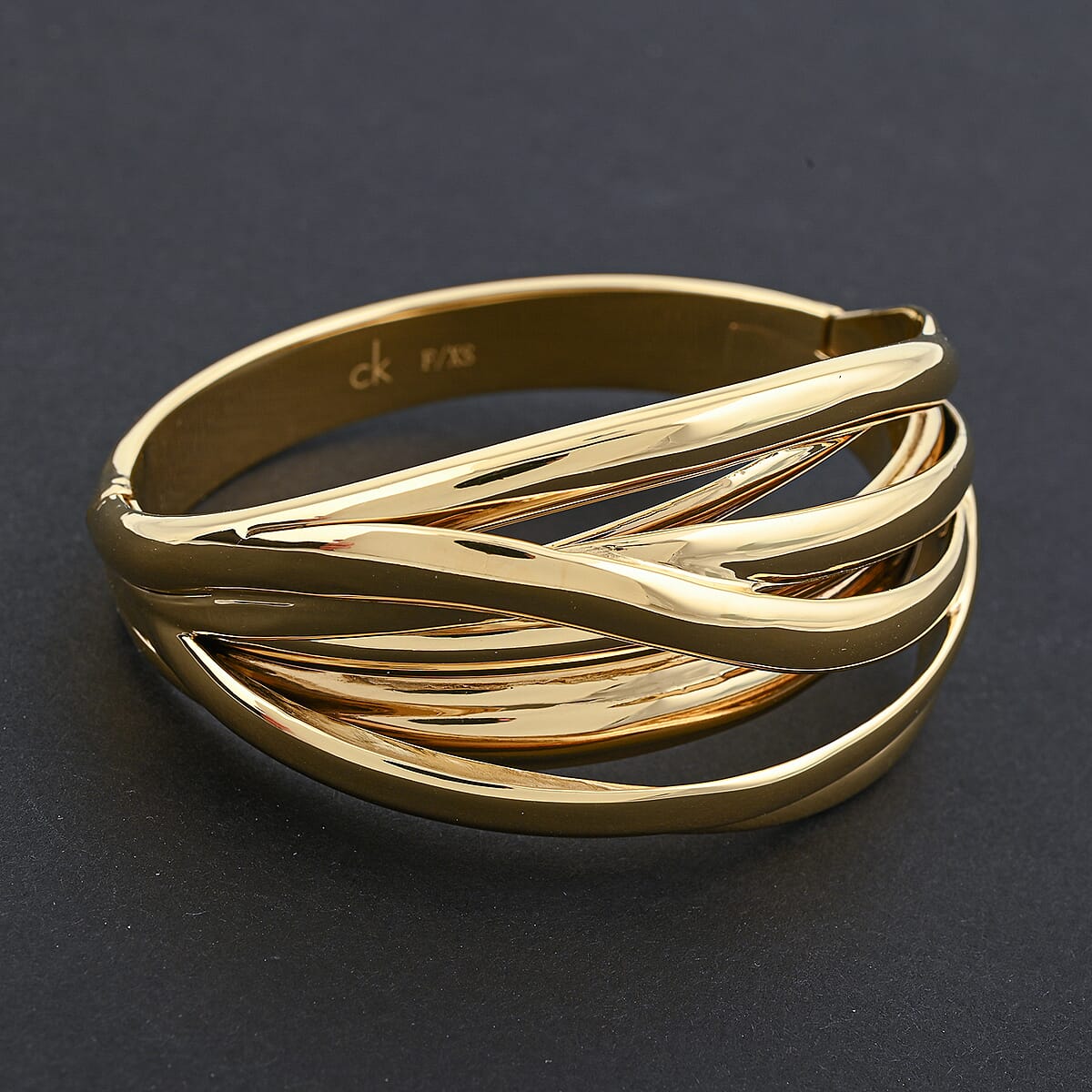 Calvin Klein Closeout Crisp Bangle Bracelet in ION Plated YG Stainless Steel (5.50 In) image number 1