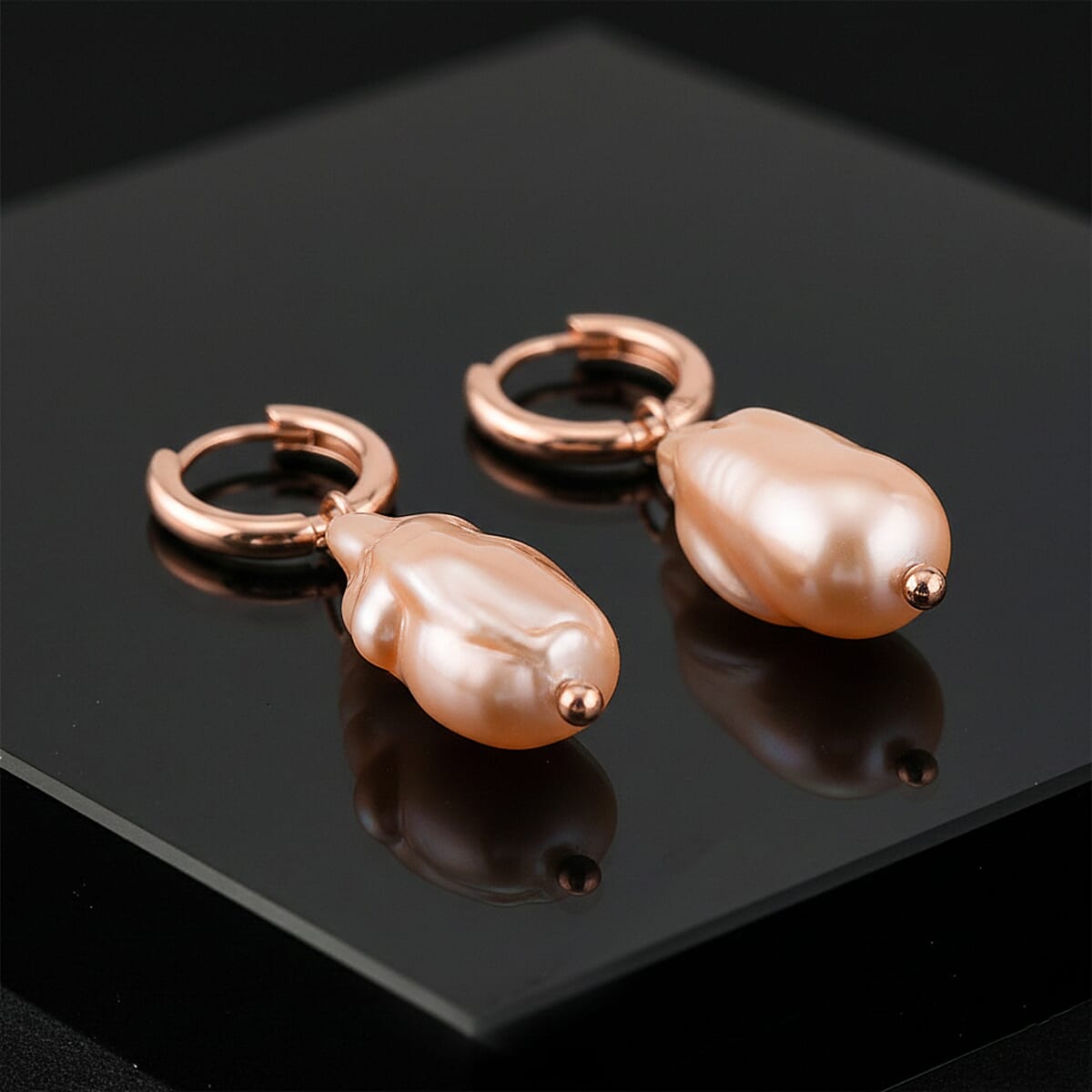 Peach Shell Pearl Earrings in ION Plated RG Stainless Steel image number 1