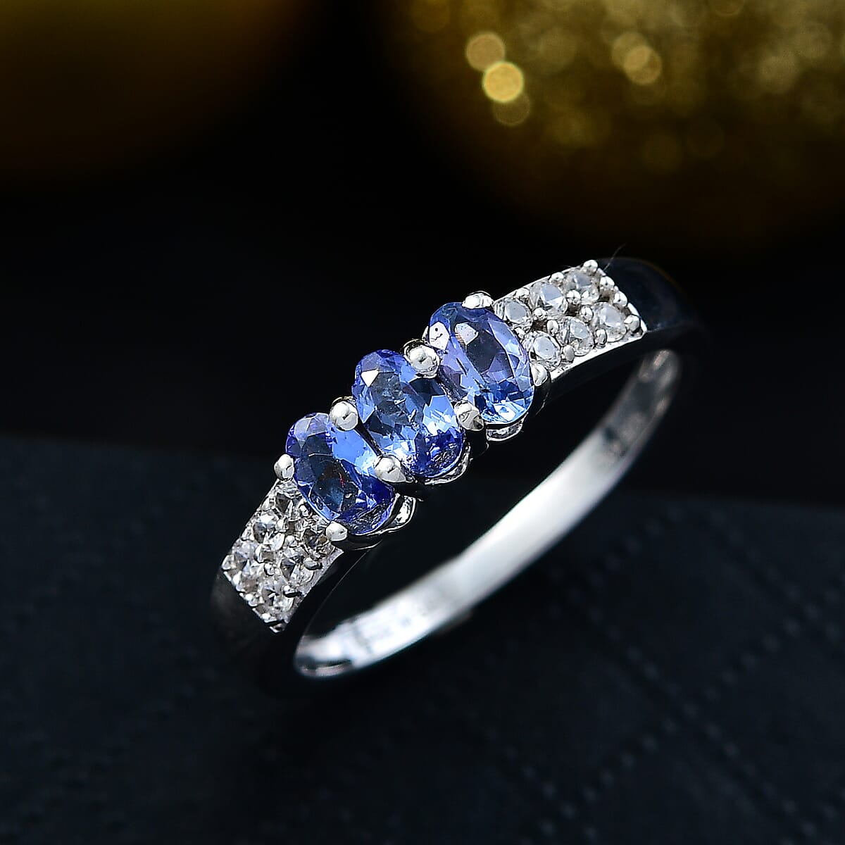 D'Joy Premium Tanzanite and White Zircon 0.90 ctw Ring in Platinum Over Sterling Silver (Size 6.0) image number 1