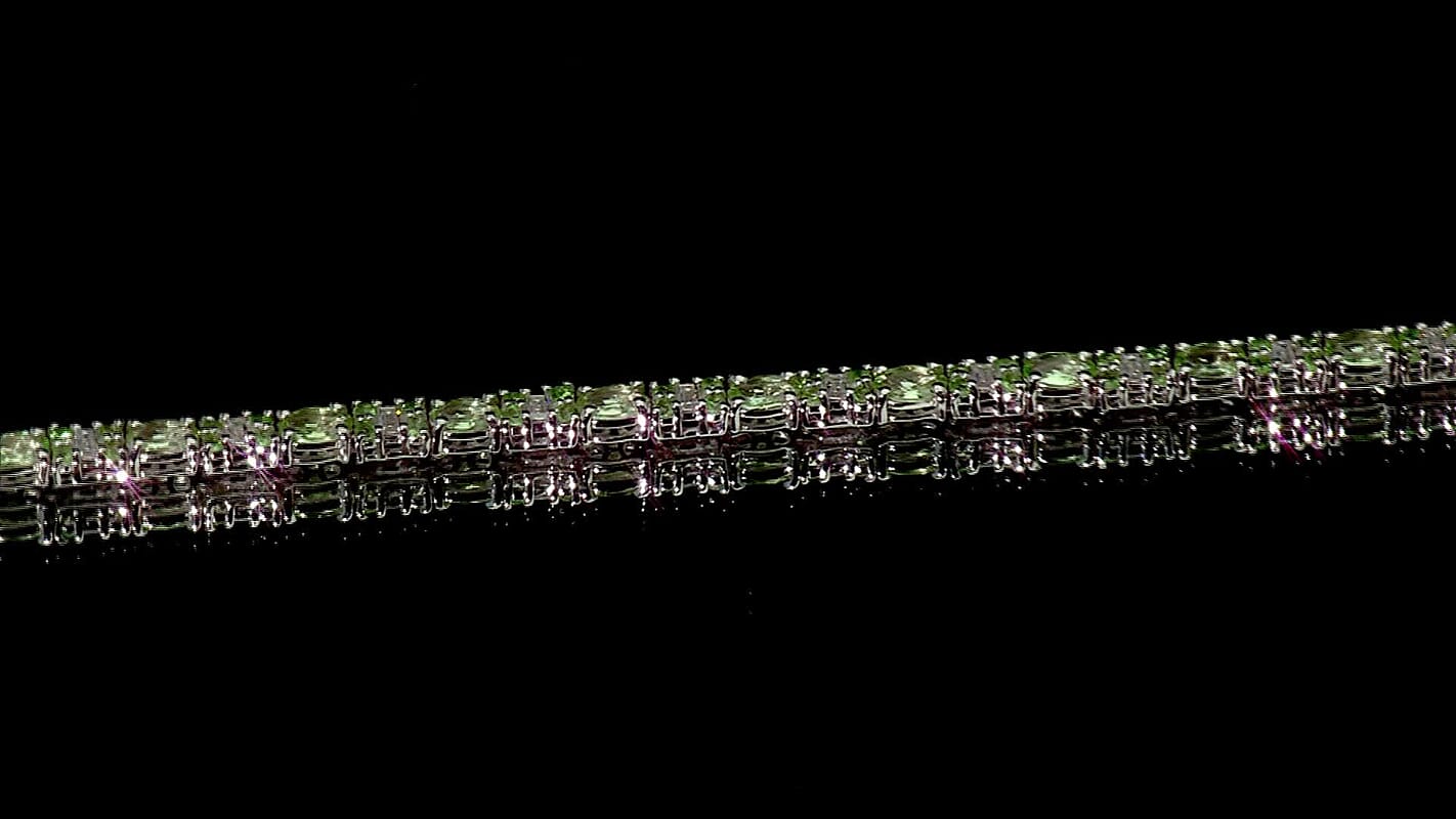 D'Joy Radiant Ember Garnet and Moissanite 6.50 ctw Bracelet in Rhodium Over Sterling Silver (6.50 In)