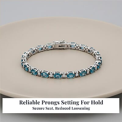 D'Joy Premium Cambodian Blue Zircon and Moissanite 19.10 ctw Ocean Glow Bracelet in Rhodium Over Sterling Silve (6.50 In)