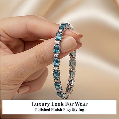 D'Joy Premium Cambodian Blue Zircon and Moissanite 19.10 ctw Ocean Glow Bracelet in Rhodium Over Sterling Silve (6.50 In)