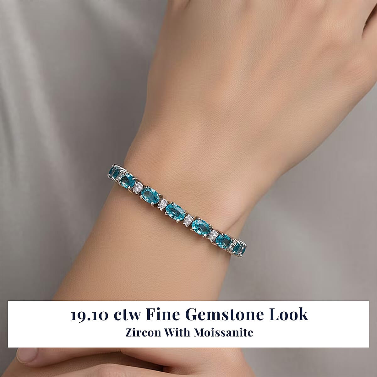 D'Joy Premium Cambodian Blue Zircon and Moissanite 19.10 ctw Ocean Glow Bracelet in Rhodium Over Sterling Silve (8.00 In) image number 1