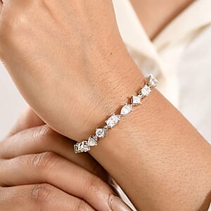 D'Joy Moissanite 8.15 ctw Cascading Droplets Bracelet in Rhodium Over Sterling Silver (6.50 In)