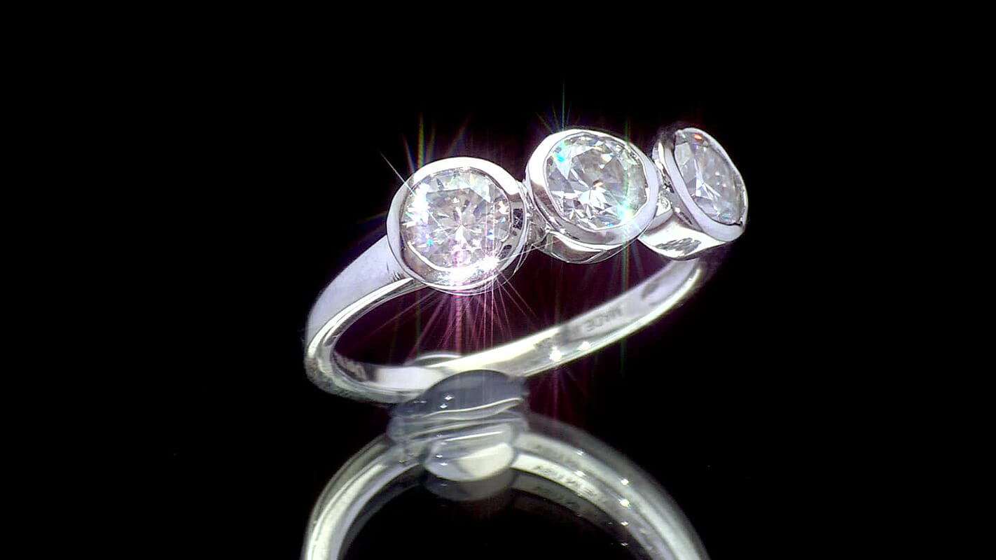 D'Joy Moissanite (Rnd 5mm) Trinity Ring in Platinum Over Sterling Silver (Size 10.0) 1.40 ctw