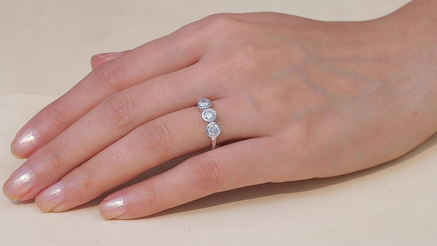 D'Joy Moissanite (Rnd 5mm) Trinity Ring in Platinum Over Sterling Silver (Size 10.0) 1.40 ctw