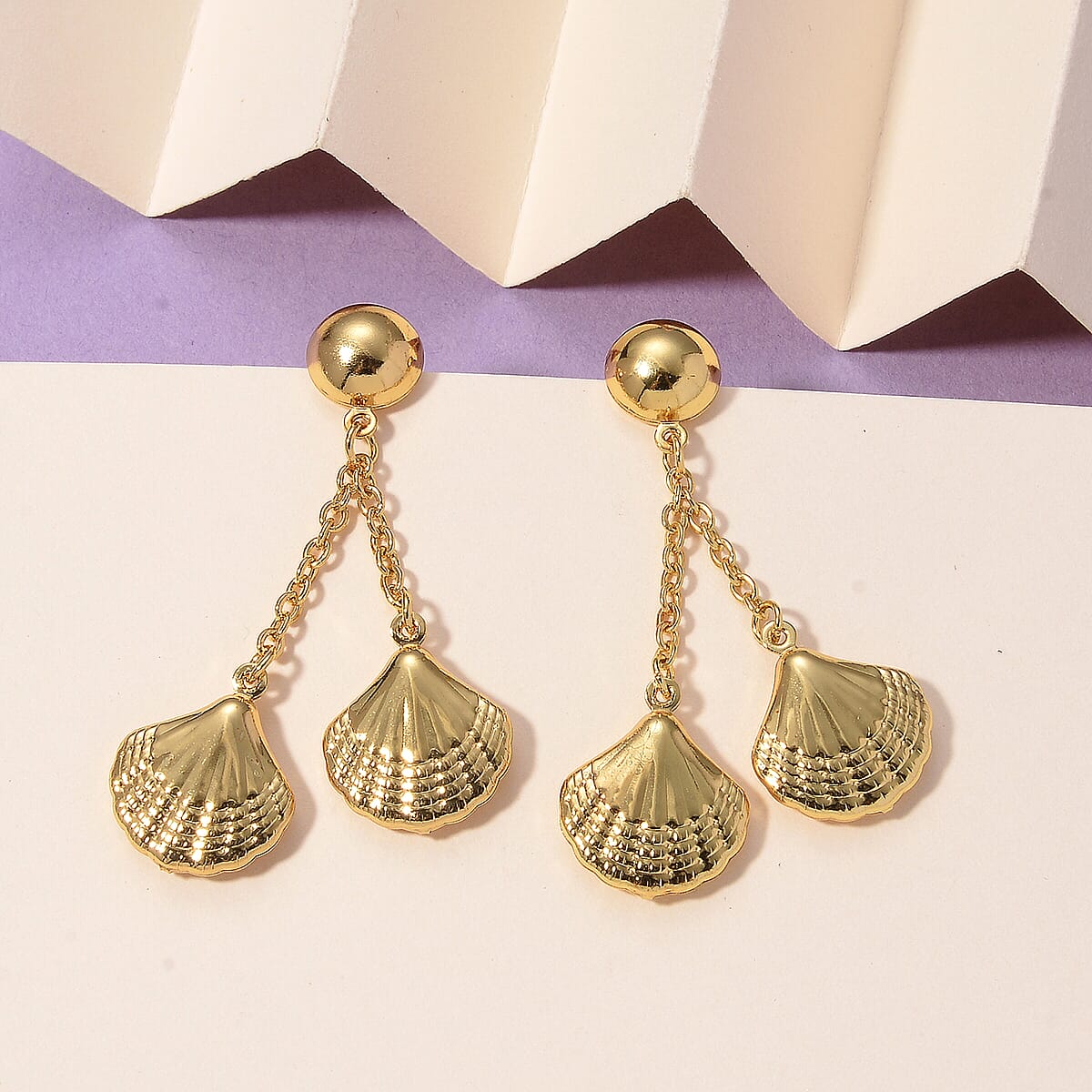 Ocean Shell Dangle Earrings in ION Plated YG Stainless Steel image number 1