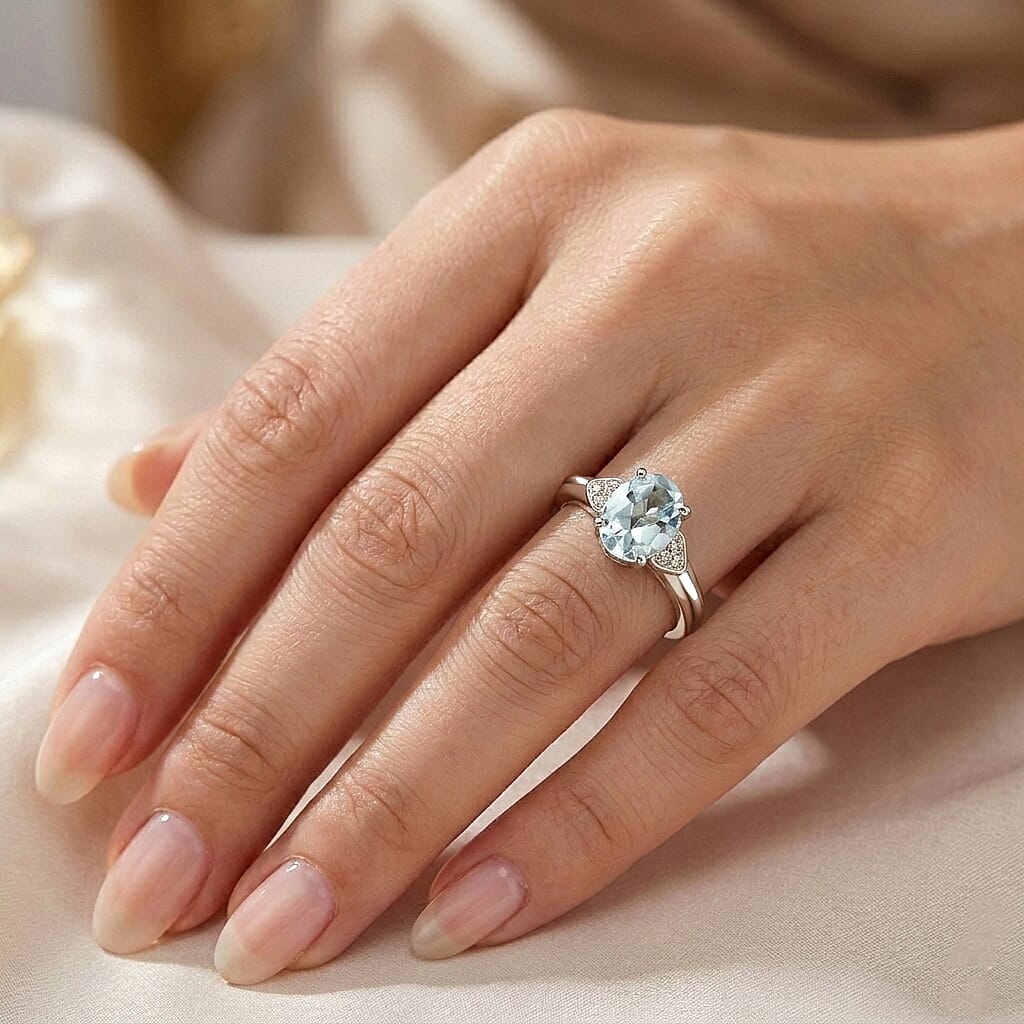 D'Joy Sky Blue Topaz and White Zircon 2.30 ctw Ring in Platinum Over Sterling Silver (Size 7.0)