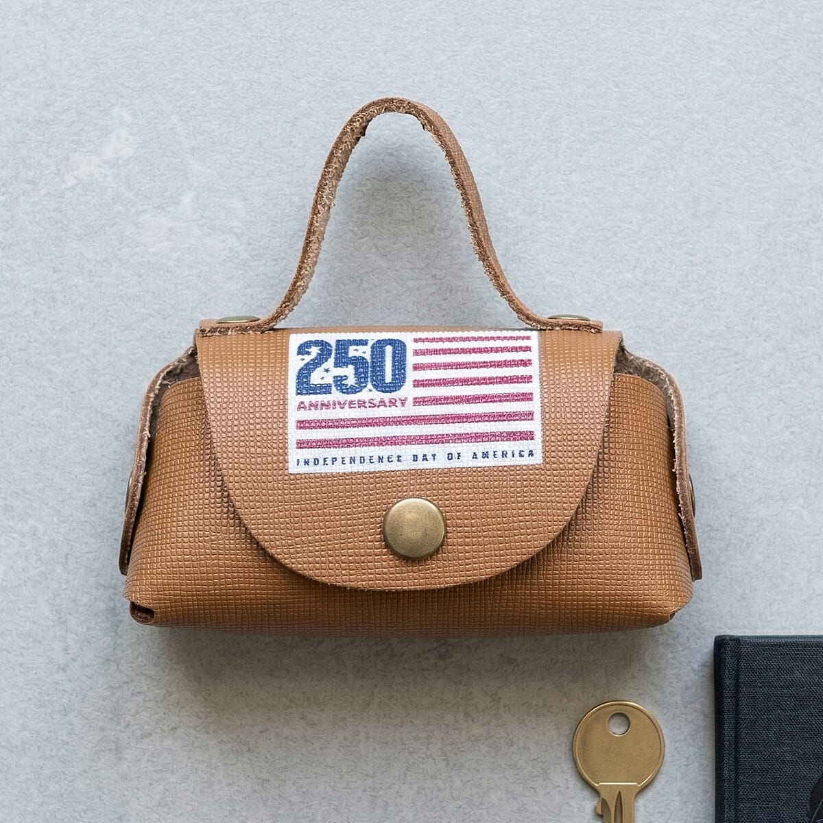 Passage Brown Genuine Leather Earbud Purse Keychain image number 1