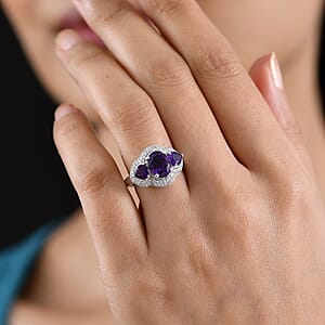 D'Joy Premium Lusaka Amethyst and Moissanite 3.00 ctw Trilogy Ring in Rhodium Over Sterling Silver (Size 6.0)