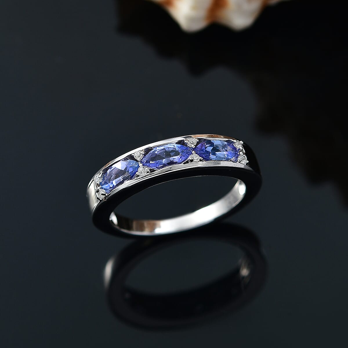 Tanzanite and White Zircon 0.90 ctw Ring in Rhodium Over Sterling Silver (Size 7.5) image number 1