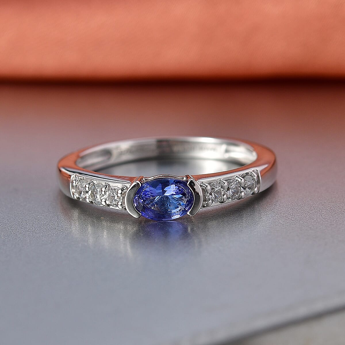 D'Joy Tanzanite and White Zircon 0.80 ctw Royal Blue Band Ring in Rhodium Over Sterling Silver (Size 6.0) image number 1