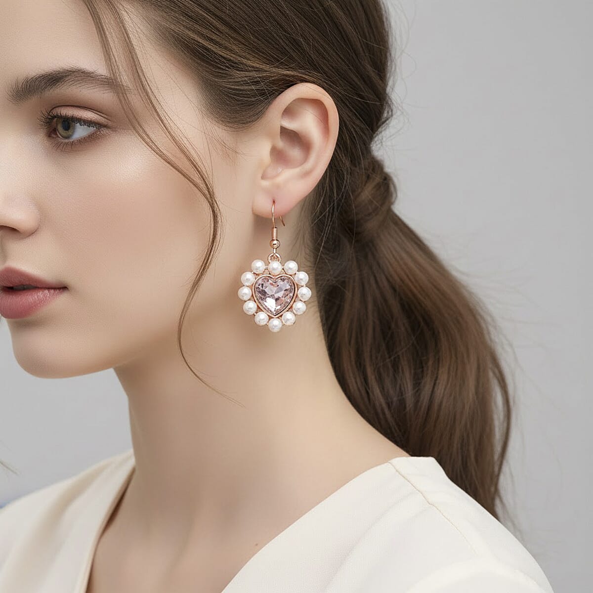 Pink Glass, White Shell Pearl Heart Earrings in Rosetone and ION Plated RG Stainless Steel image number 2