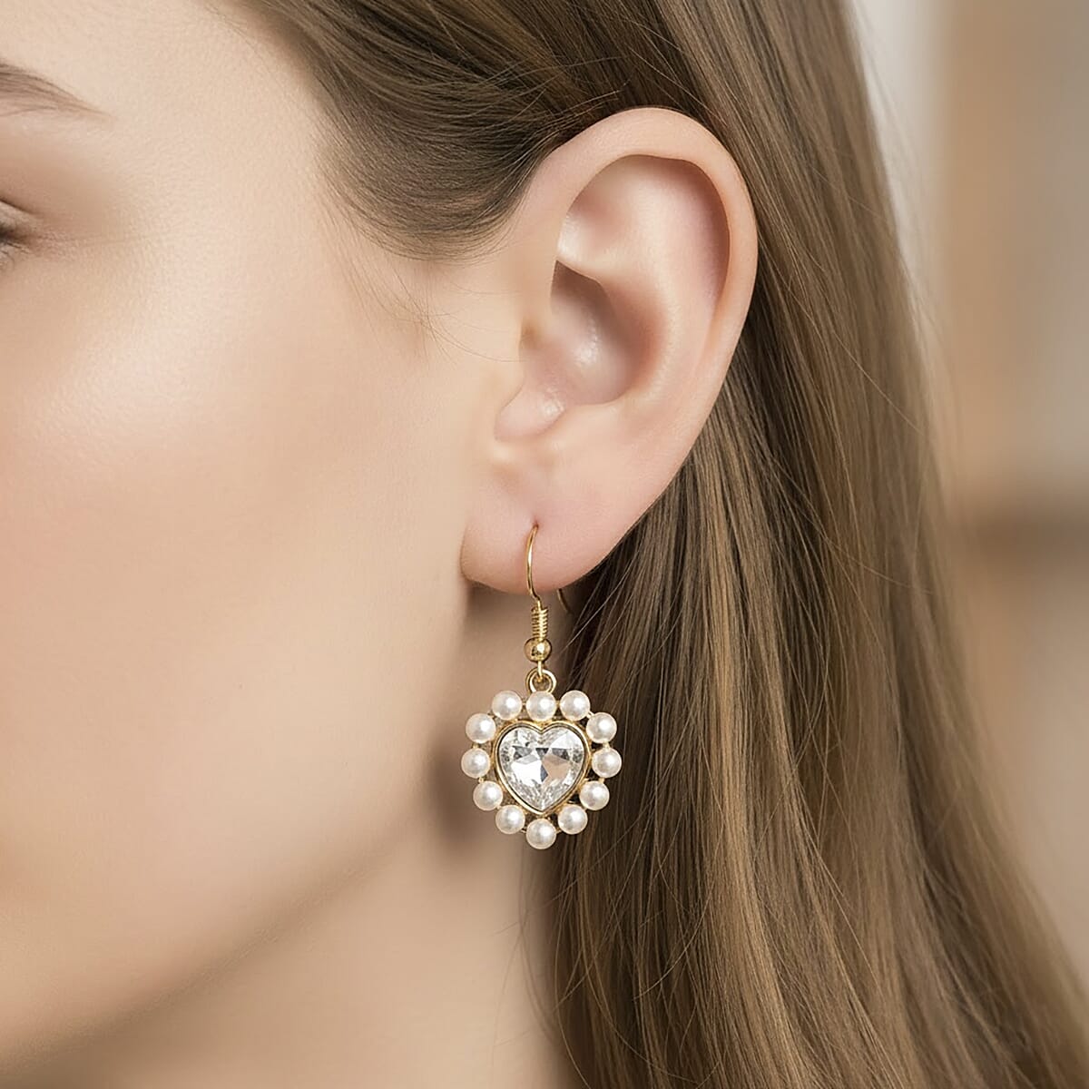 White Glass, White Shell Pearl Heart Earrings in Goldtone and ION Plated YG Stainless Steel image number 2