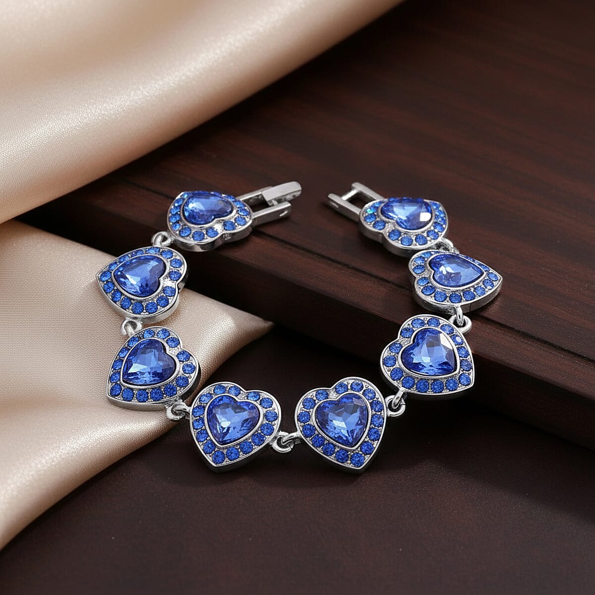 Blue Austrian Crystal and Blue Glass Heart Link Bracelet in Silvertone (7.75 In) image number 1