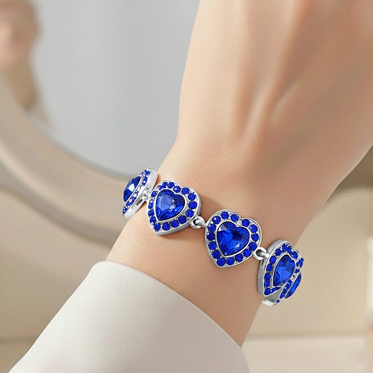 Blue Austrian Crystal and Blue Glass Heart Link Bracelet in Silvertone (7.75 In) image number 2