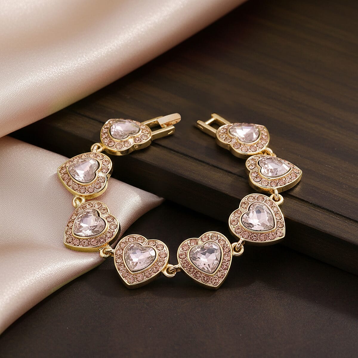 Champagne Austrian Crystal and Champagne Glass Heart Link Bracelet in Goldtone (7.75 In) image number 1