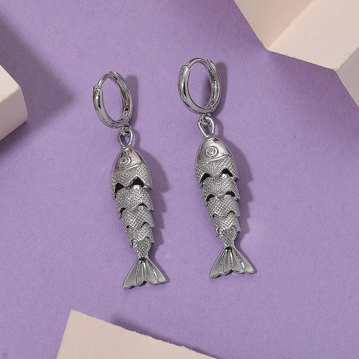 Simulated Diamond Fish Earrings in Silvertone image number 1