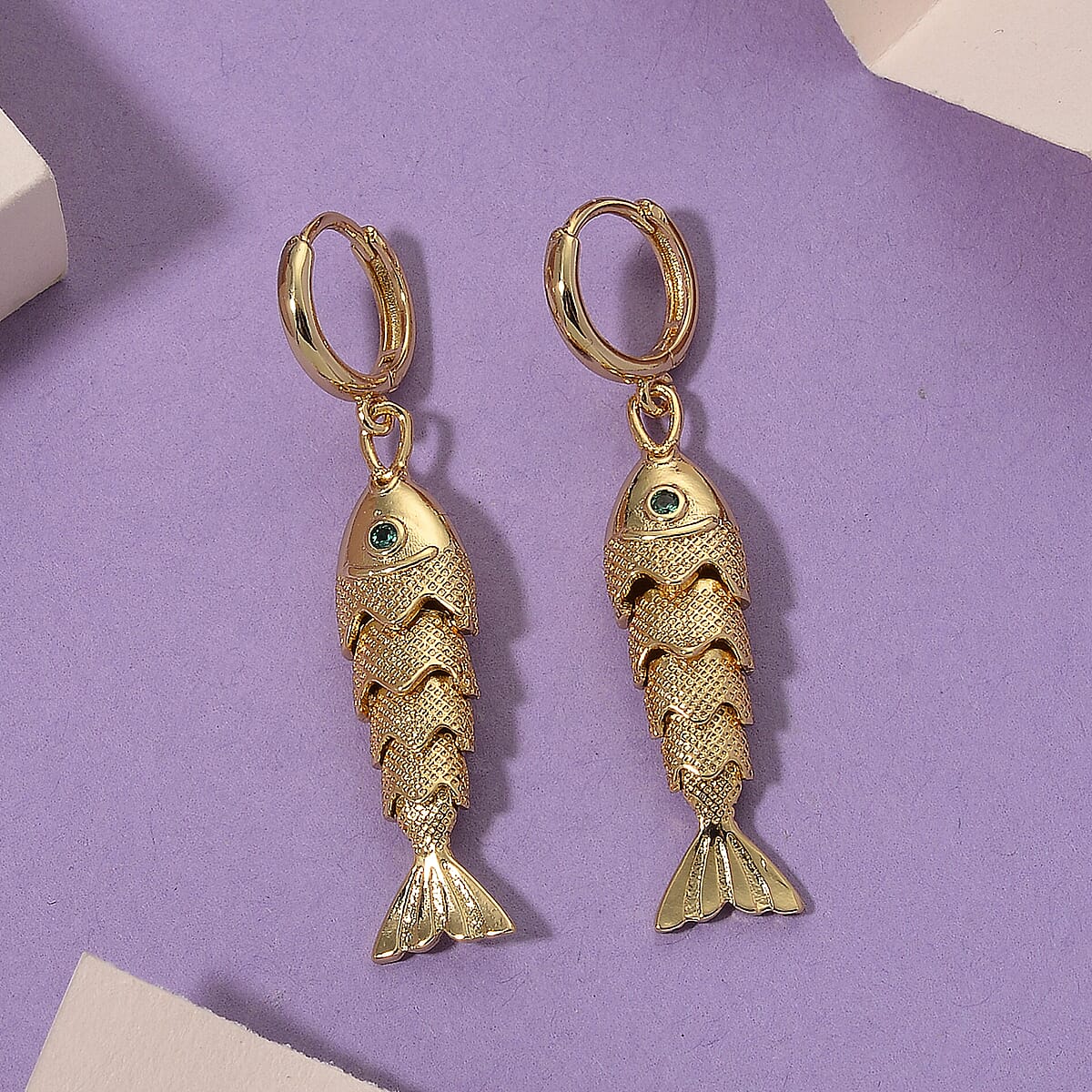 Simulated Green Diamond Fish Earrings in Goldtone image number 1