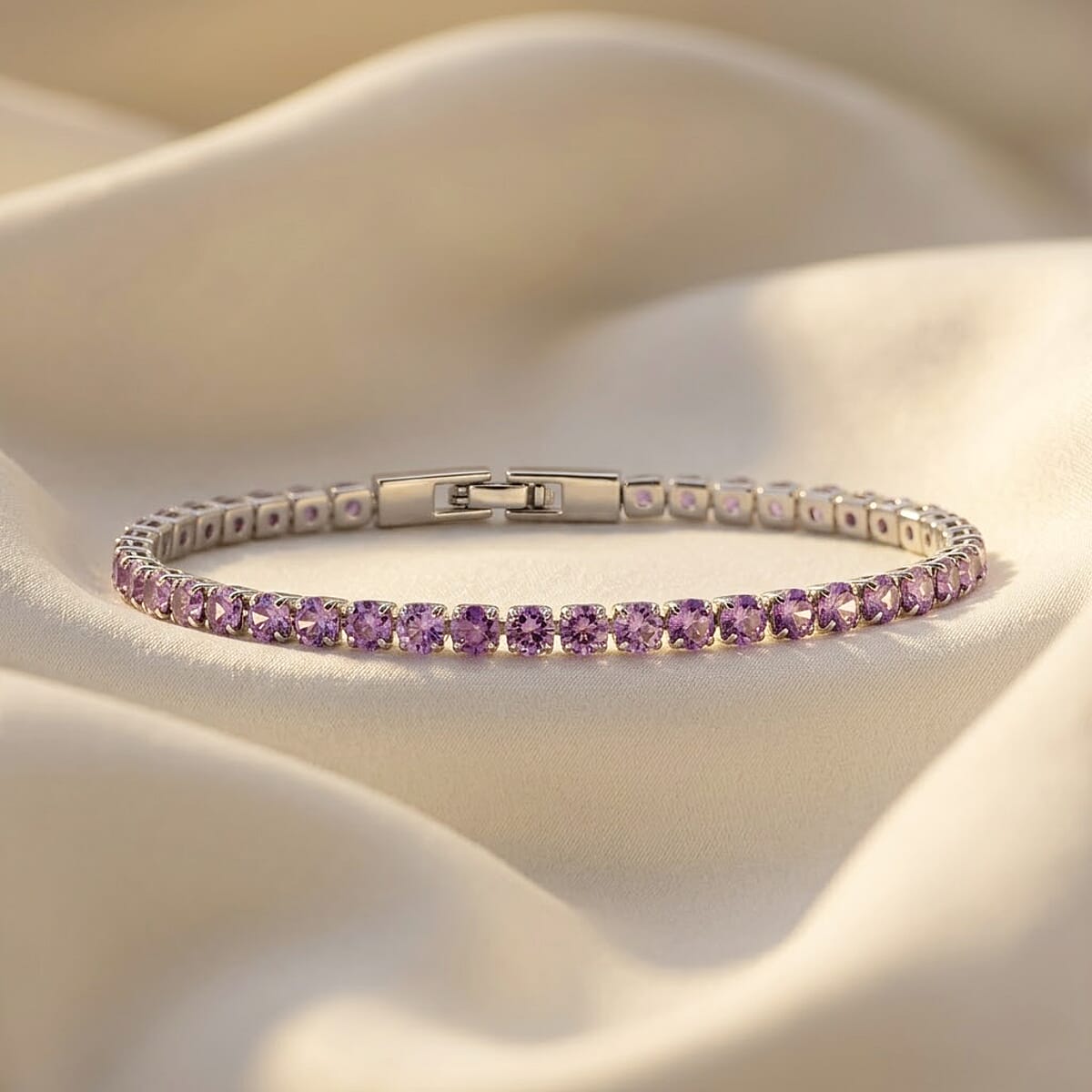 Simulated Amethyst Color Diamond Bracelet in Silvertone (7.50 In) image number 1