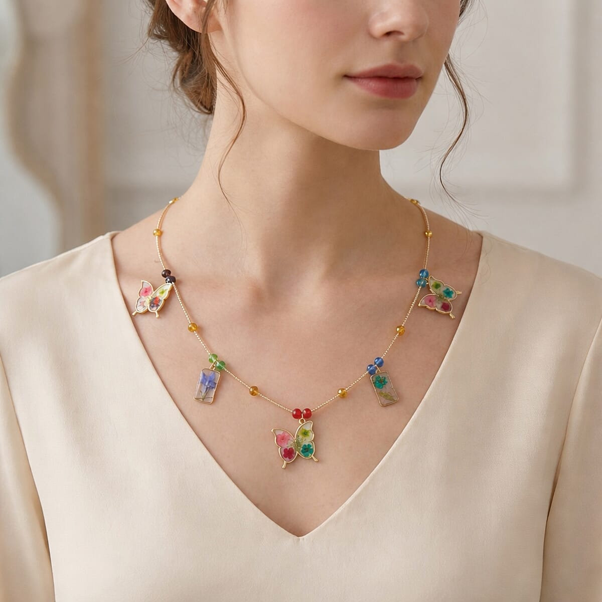 Resin, Multi Color Glass Necklace with Dry Flowers Filled Butterfly Charms in Goldtone (20-22Inches) image number 2
