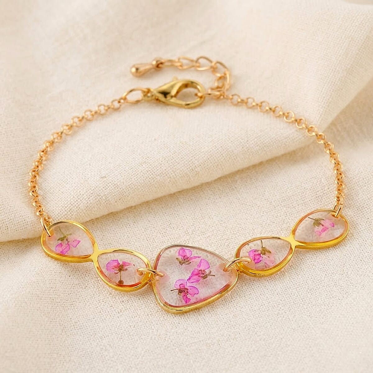 Resin Bracelet with Dry Flowers Filled Triangle Shaped Charms in Goldtone (7.5-8.5In) image number 1