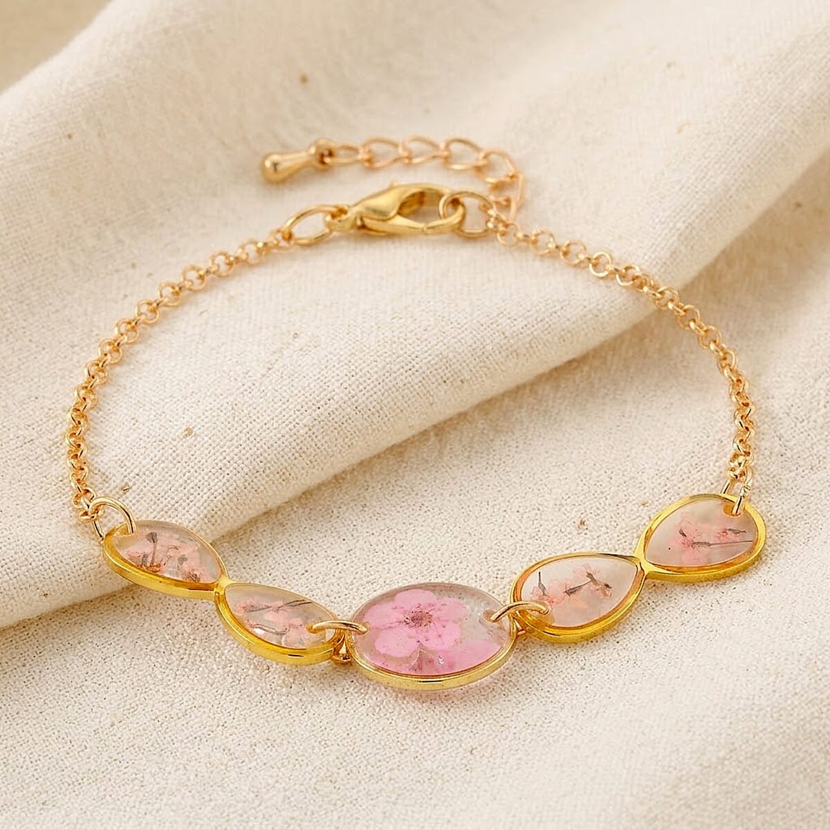 Resin Bracelet with Dry Flowers Filled Round Shaped Charms in Goldtone (7.5-8.5In) image number 1