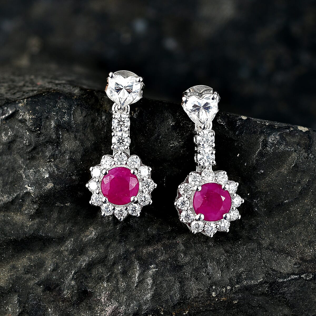 Certified & Appraised D'Joy Premium Montepuez Ruby and Moissanite 4.37 ctw Earrings in Rhodium Over Sterling Silver image number 1