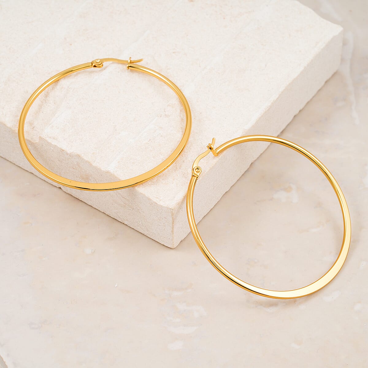 Hoop Earrings in ION Plated YG Stainless Steel image number 1