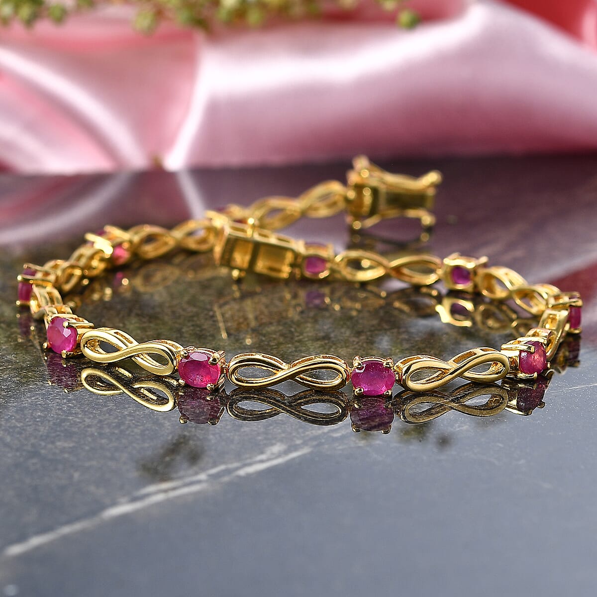 EverTrue Niassa Ruby (FF) 5.50 ctw Infinity Line Bracelet in 18K Yellow Gold Plated (8.00 In) image number 1