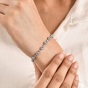 D'Joy Santa Maria Aquamarine and Moissanite 4.85 ctw Ocean Crown Bracelet in Rhodium Over Sterling Silver (7.25 In)