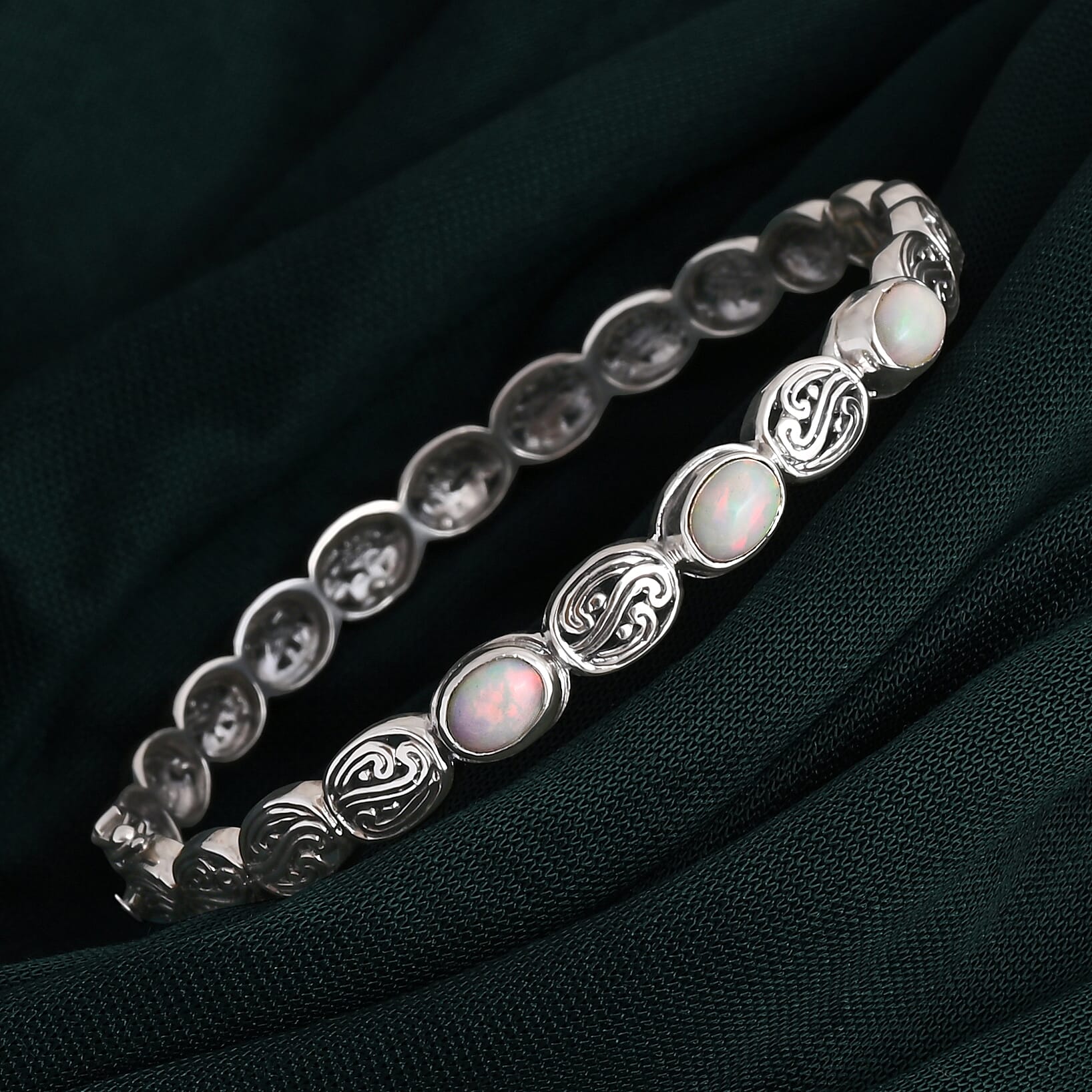 D'Joy Bali Legacy Ethiopian Welo Opal 1.50 ctw Bangle Bracelet in Sterling Silver (7.25 In)