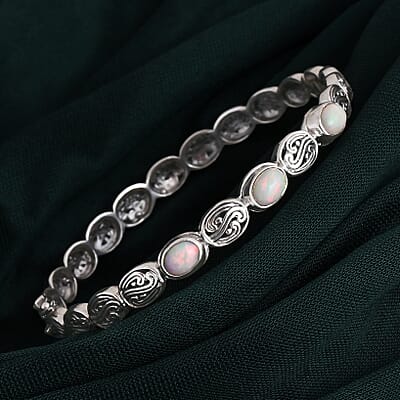 D'Joy Bali Legacy Ethiopian Welo Opal 1.50 ctw Bangle Bracelet in Sterling Silver (7.25 In)