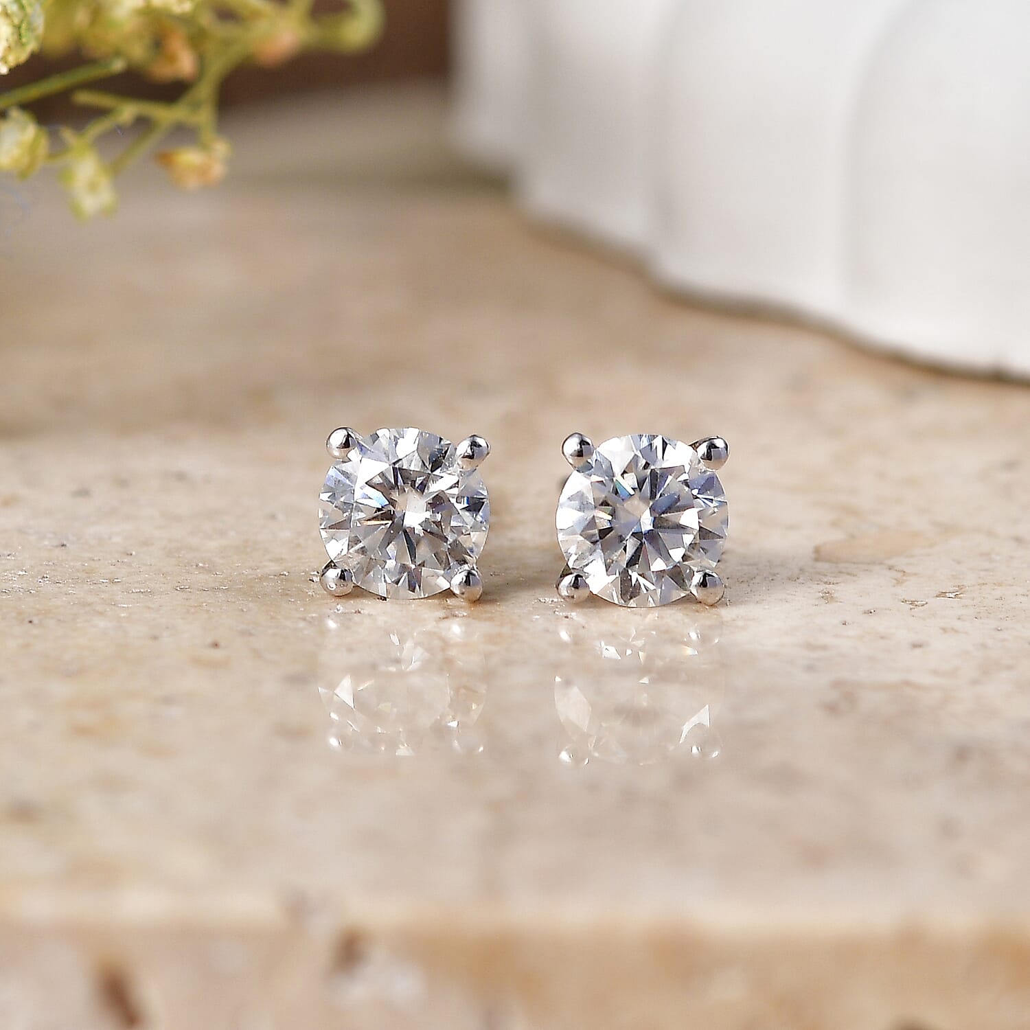 D'Joy Moissanite 1.50 ctw Solitaire Stud Earrings in Rhodium Over Sterling Silver