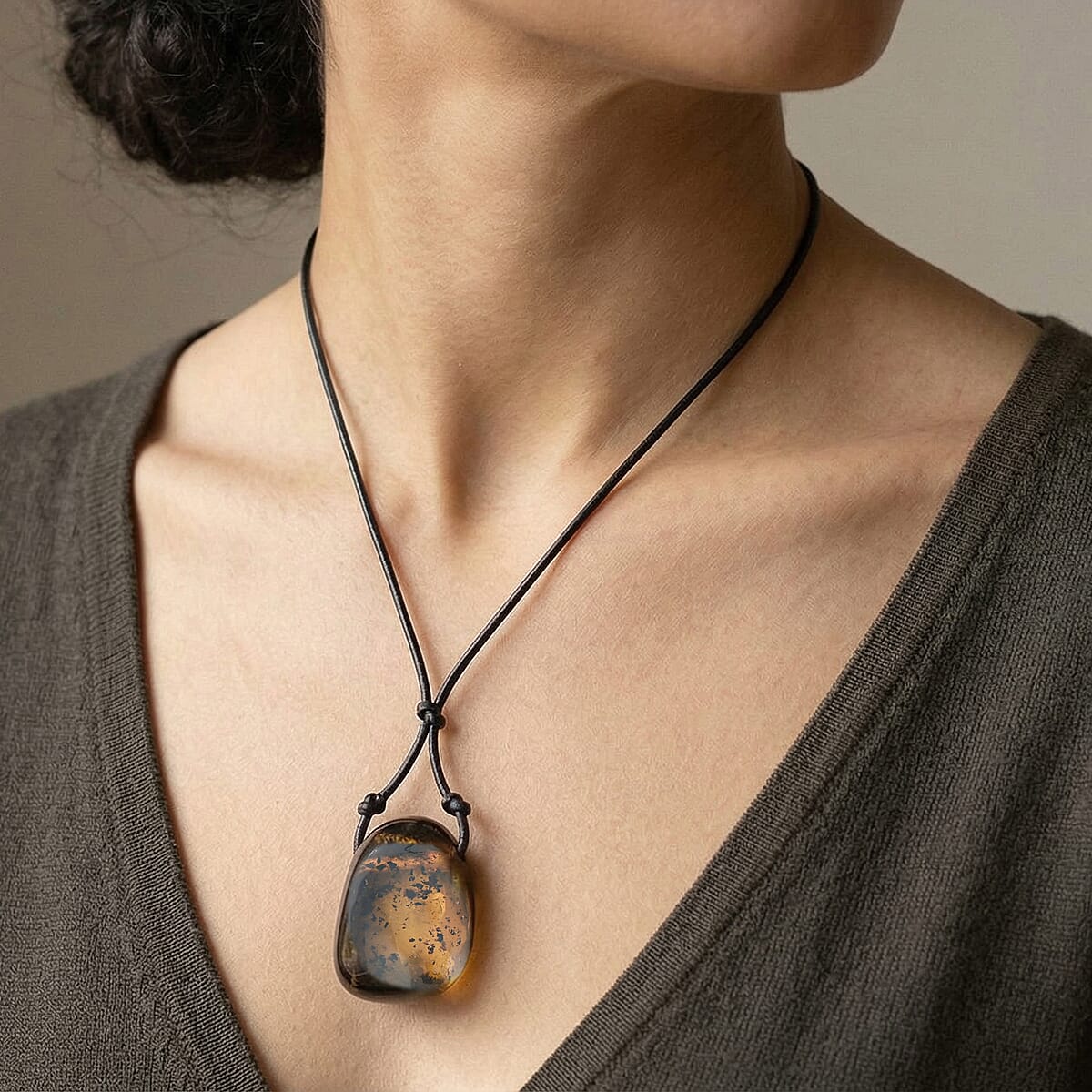 Butterscotch Amber Black Leather Necklace (32 Inches) image number 2