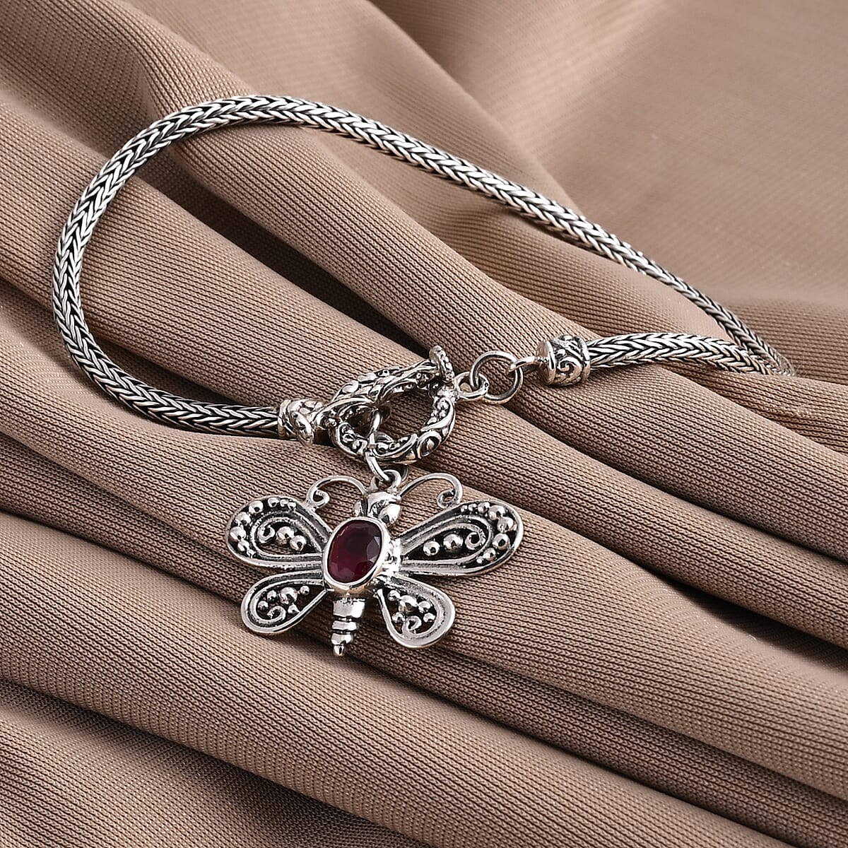 Bali Legacy Niassa Ruby (FF) 1.20 ctw Bracelet with Butterfly Charm in Sterling Silver (8.00 In) image number 1