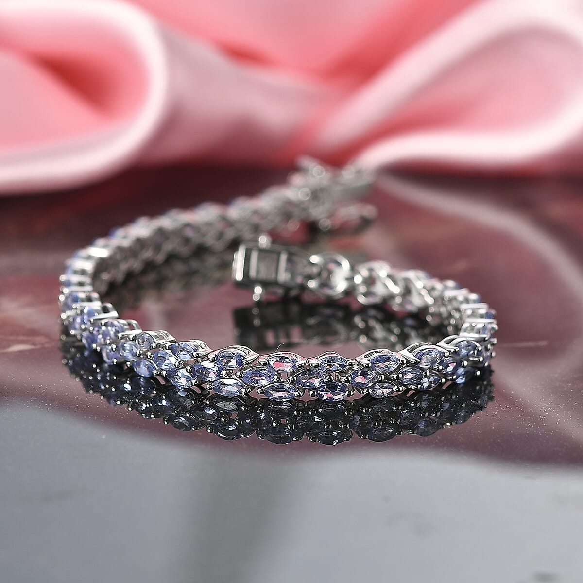 D'Joy Tanzanite 7.70 ctw Floral Garland Tennis Bracelet in Rhodium Over Sterling Silver (6.50 In) image number 1