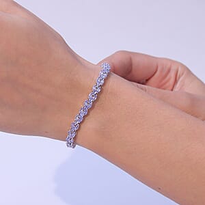 D'Joy Tanzanite 7.70 ctw Floral Garland Tennis Bracelet in Rhodium Over Sterling Silver (6.50 In)