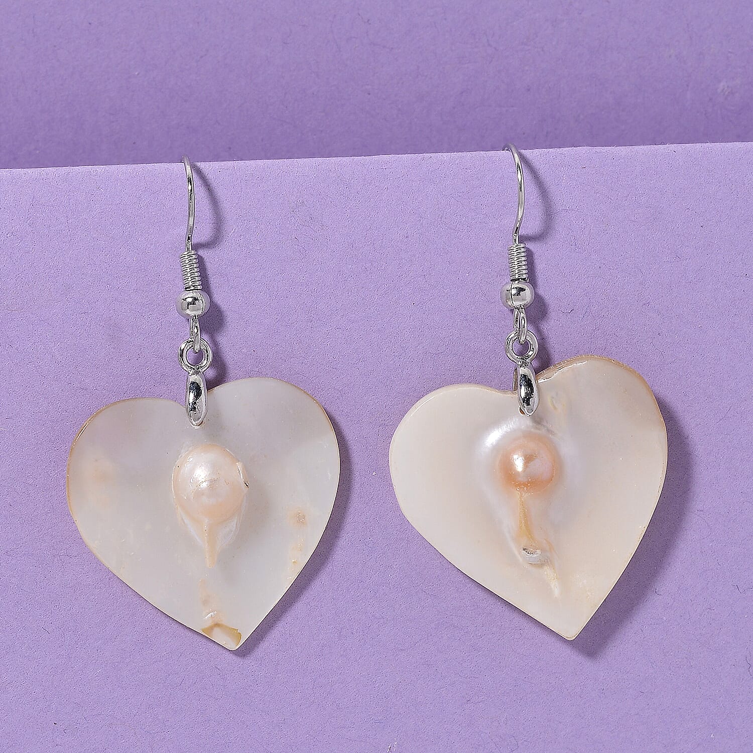 Black Mother of Pearl Heart Earrings in Silvertone