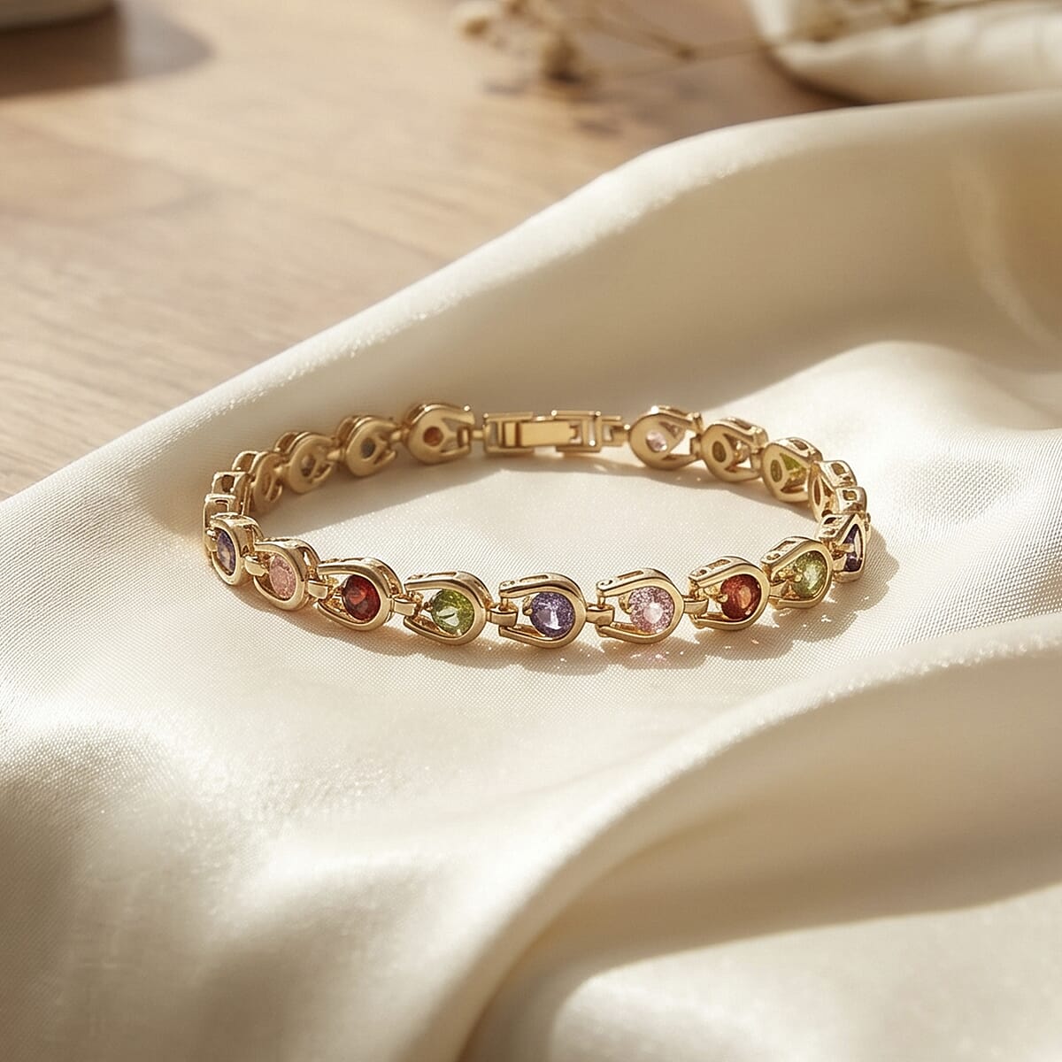 Simulated Multi Color Diamond Bracelet in Goldtone (7.50 In) image number 1
